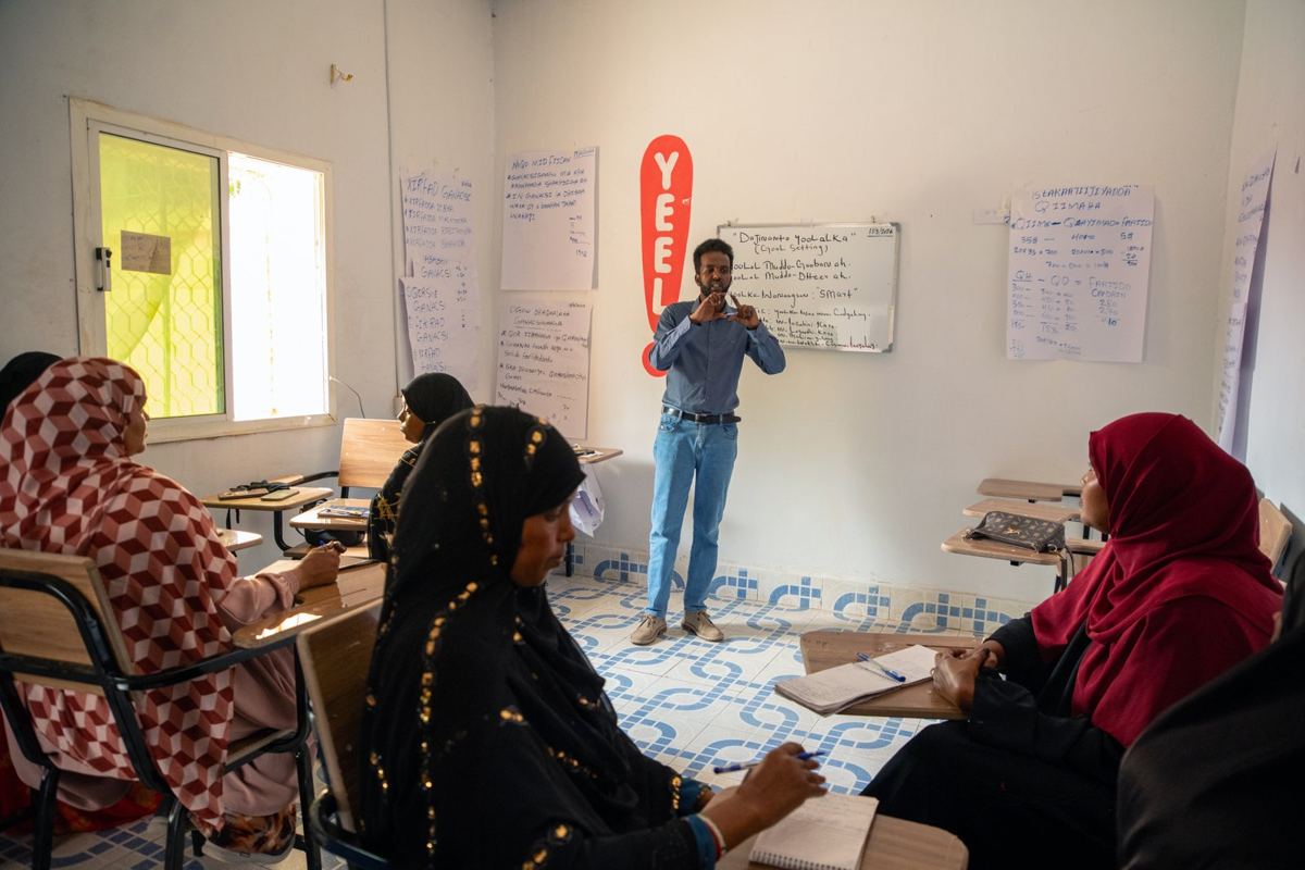 A trainer talking to the class