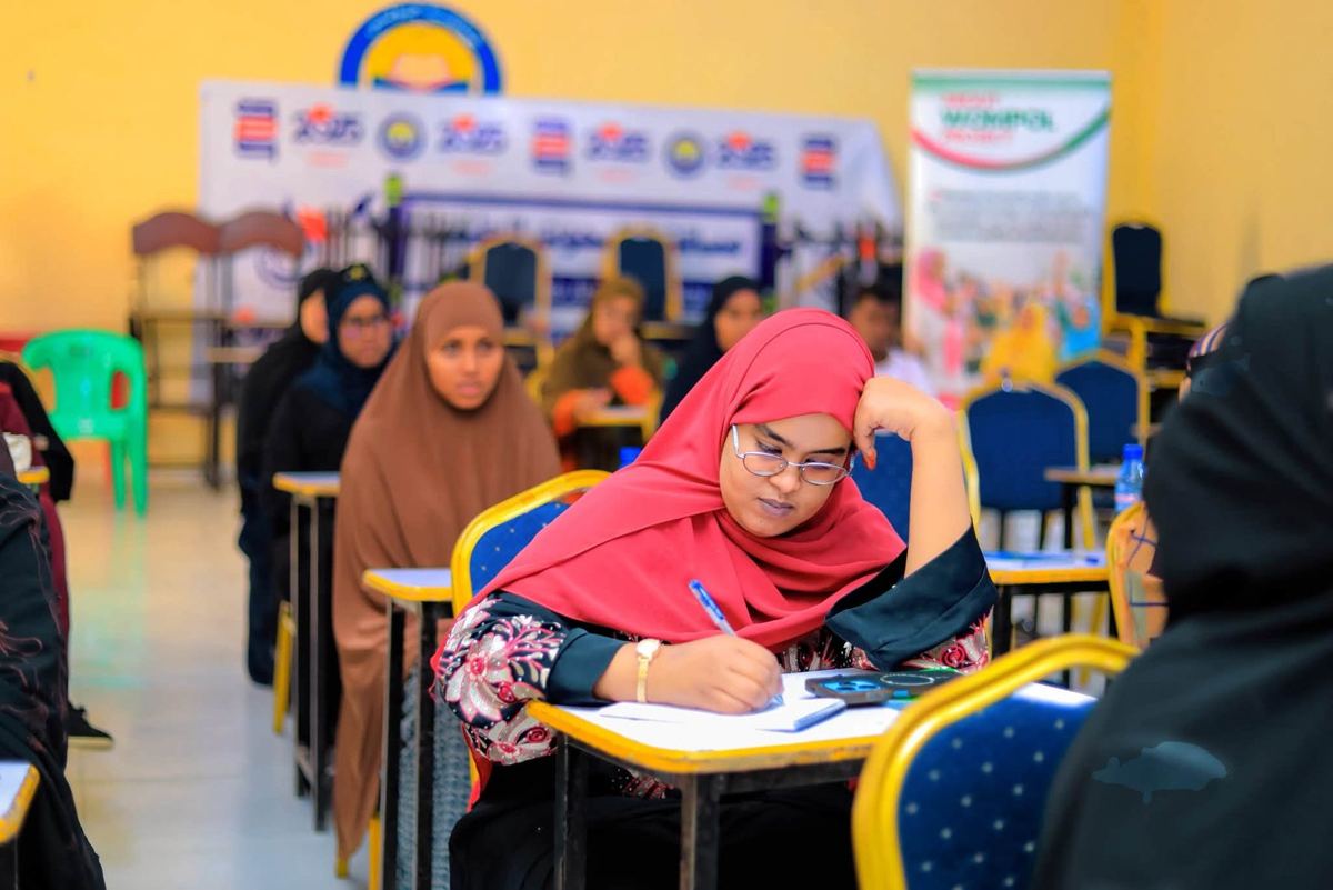 Young women writing an exam