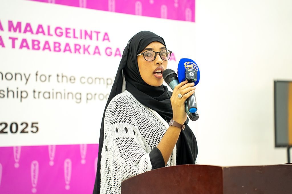 A young woman speaking at a YEEL ceremony