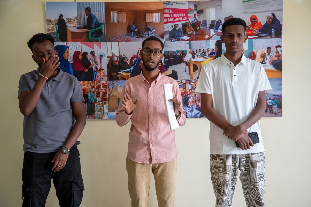 Participants practising a presentation