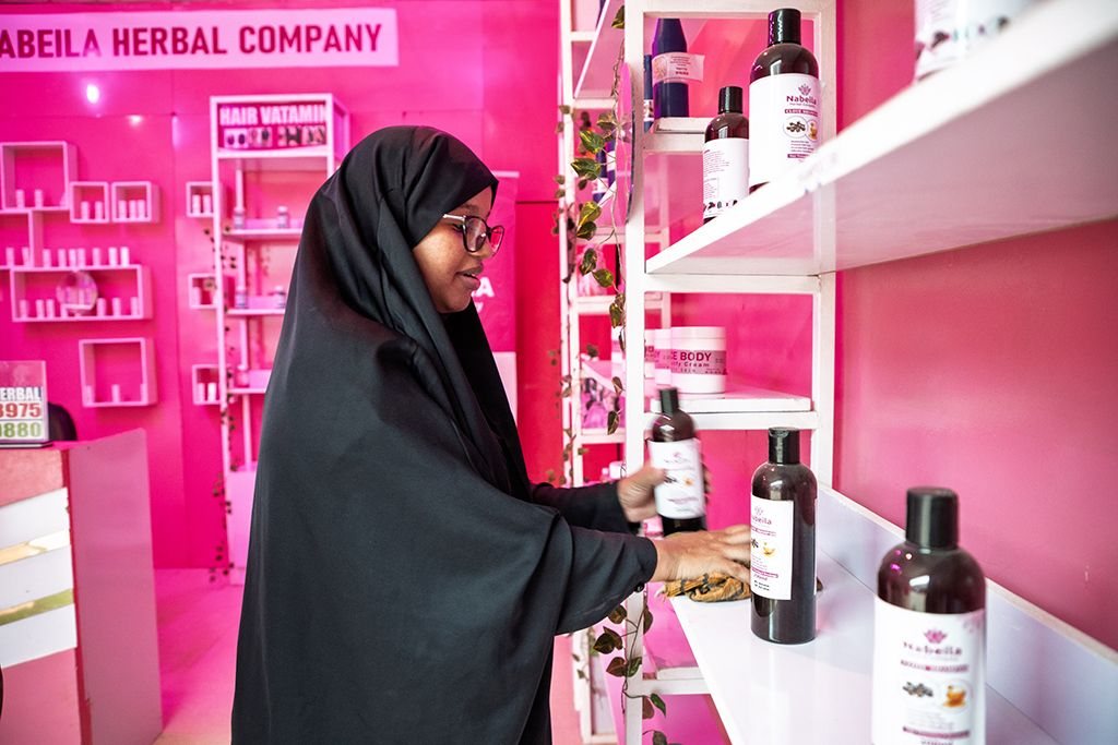 A young woman in her shop in Burao