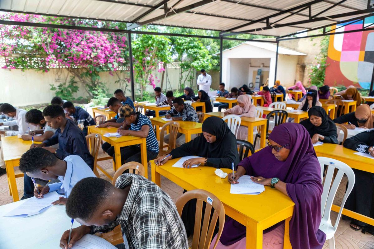 Participants writing their final exam in YEEL's entrepreneurship class