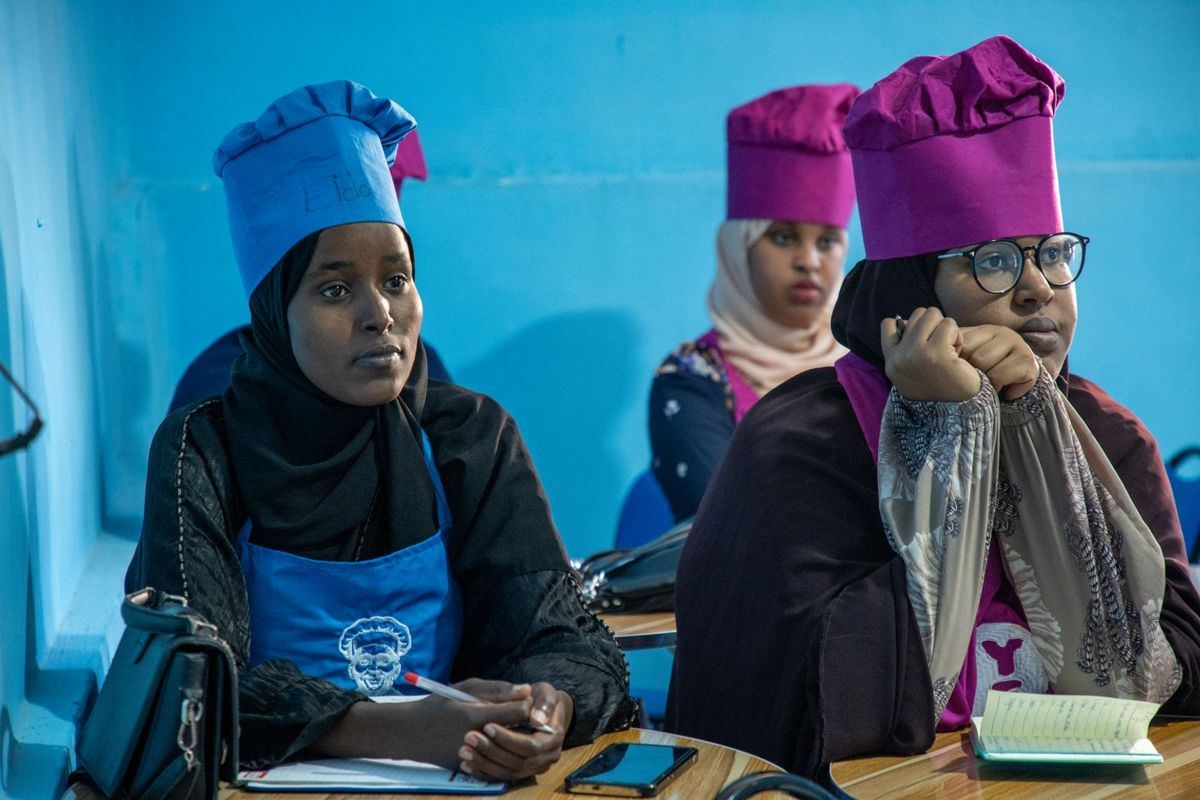 Young women in a cooking course
